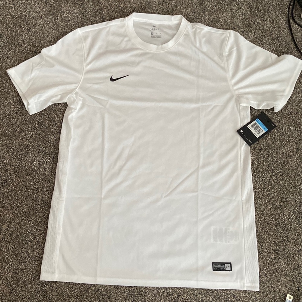 Mens Nike Dri-Fit shirt with side venting. Size Medium.